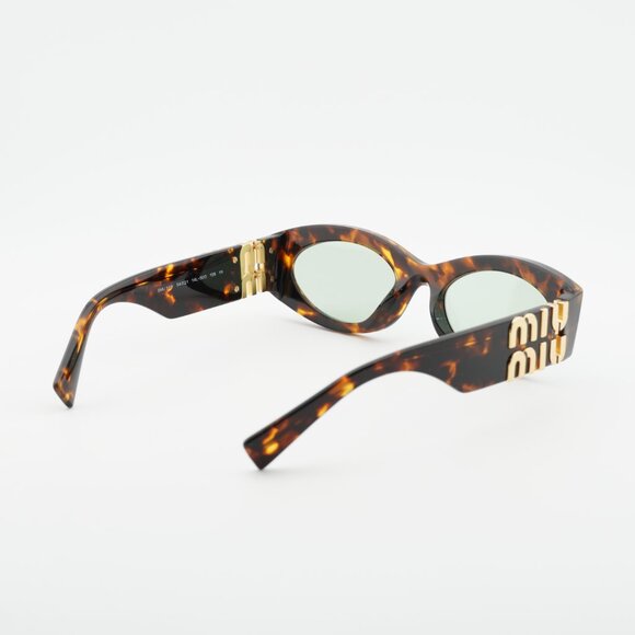 Miu Miu MU11WS 14L50O Sunglasses Honey Havana Oval Frame, Light Green Lenses